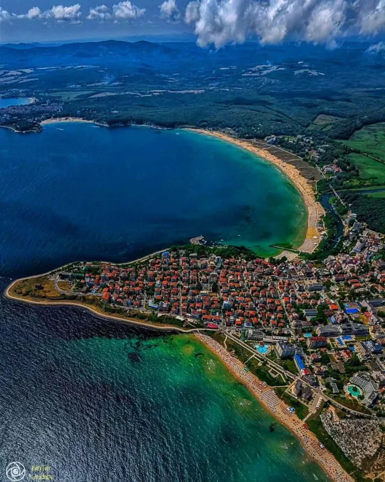 Aerial view of Primorsko, Bulgaria, venue of the Erasmus+ Partnership Building Activity — the town on a peninsula between two Black Sea beaches